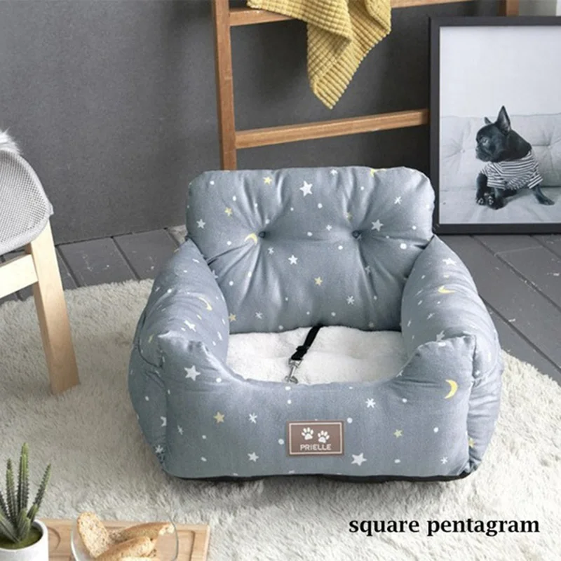 Blue starry sky comfortable pet car seat bed keeping a dog safe on a road trip.