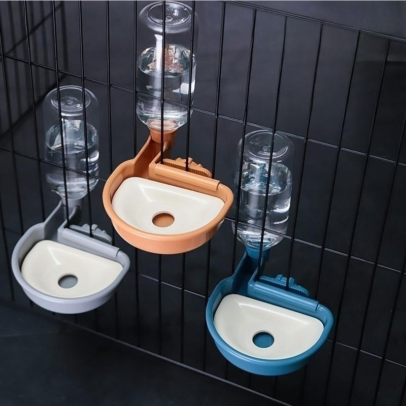 Anti-tip hanging automatic pet water dispenser for travel cages.