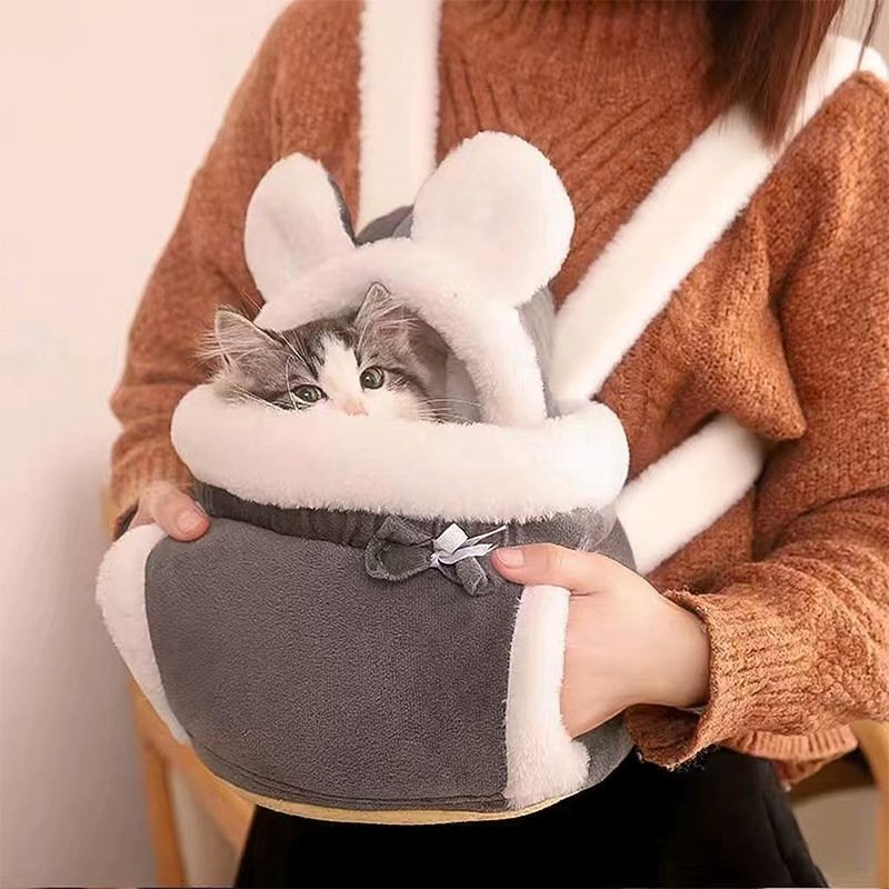 Safe and comfortable bubble window cat carrier for stress-free pet travel.